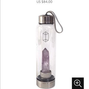 Amethyst glass water bottle.